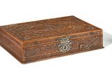 an image of a wooden box with carvings on it