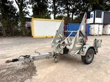 an image of a tow truck with a trailer attached to it