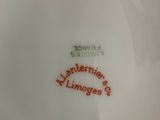 a white plate with a red inscription on it