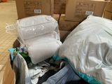 a pile of boxes that are sitting on the floor