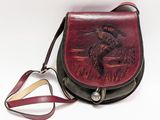 a brown and black purse with a duck on it