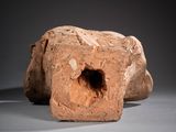 a large rock with a hole in the middle of it