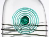 a glass vase with a spiral design inside of it