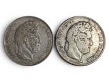two silver coins with a man ' s face and a woman ' s head