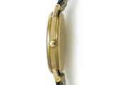 an image of a close up of a wrist watch on a white surface