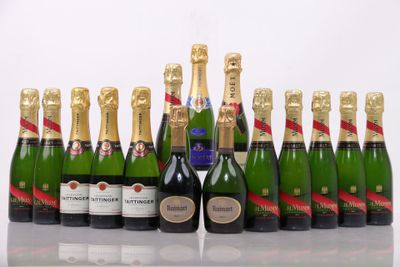 bottles of champagne lined up in a row on a table
