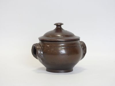 an image of a brown ceramic pot with a lid on a white background