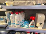 many bottles of cleaning products on the shelves in the store