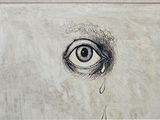 drawing of an eye with a tear coming out of it