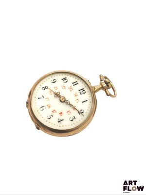 a gold pocket watch on a white background with the words art flow