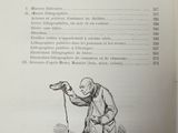 an old book with a drawing of a man kneeling down