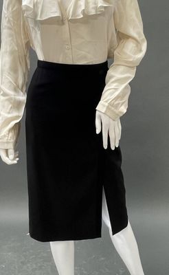 an image of a mannequin wearing a white shirt and black skirt