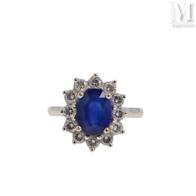 Bague marguerite saphir Bague marguerite en or gris 18K (750…