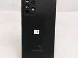 a close up of the back of a black samsung galaxy s20