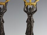 pair of antique bronze and marble candlesticks with female figures
