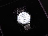a watch that is sitting in a box on a table