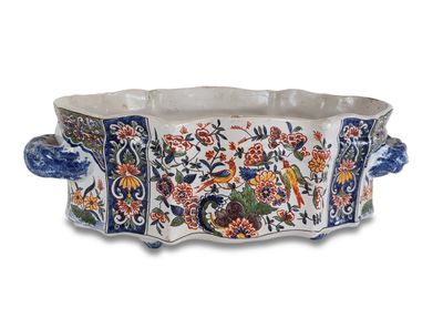 an image of a decorative planter with flowers and birds on it