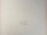 an open book with a black and white drawing on it