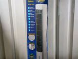 a box that has a small air purifier inside of it