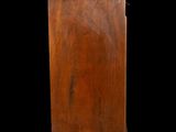 an old wooden cabinet with a black background and a black background