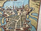 painting of a map of a city in a frame on a table