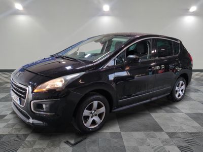 a picture of a black car parked in a garage