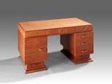 a wooden desk with three drawers and two drawers on each side