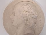 an image of a plaster portrait of a woman