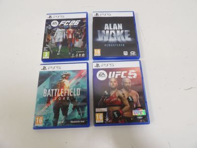 three video games are on a table with a white table cloth