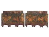 pair of antique painted wooden chests with flowers and leaves on them