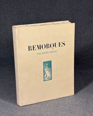 an old book sitting on top of a table next to a black background