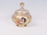 a glass jar with a picture of a woman on it