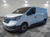 a white van parked in a room with a checkered floor