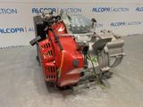 an image of a red engine is sitting on the floor