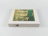the box is white and has a picture of a person in a forest
