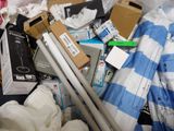 a pile of assorted items in a pile on the floor