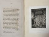 an open book with a picture of a door in it