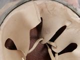 a close up view of a baseball glove with a ball inside of it