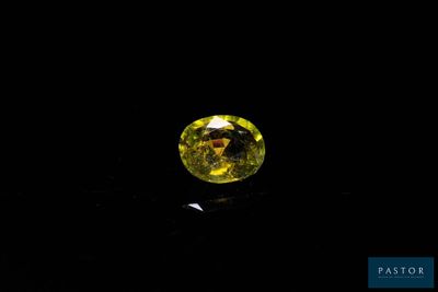 a yellow diamond on a black background