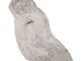 a white stone sculpture of a bird on a white background