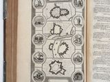 an open book with a map of the world on it