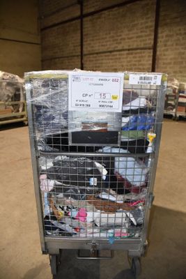 a cart with a lot of items in it in a warehouse