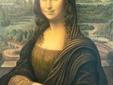 a painting of a woman with long hair sitting in front of a painting of a landscape