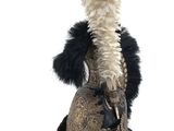a black and white hat with feathers on it