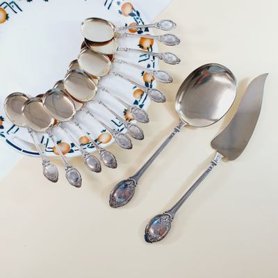 a plate with spoons and a plate with spoons and spoons on it