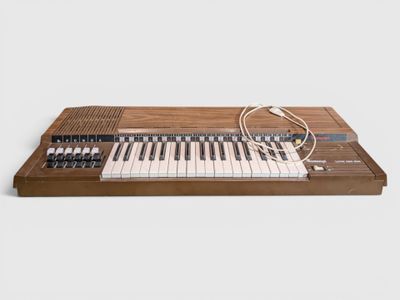 a close up of an electronic keyboard on a white surface