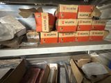 many boxes of food on a shelf in the kitchen
