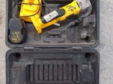 a tool in a case that is sitting on the ground