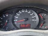 a close up of a speedometer in a car