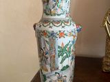 a vase that is sitting on a table in a room